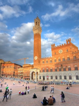 Siena's Piazza del Campo with historic buildings, part of Florence to Siena tours.