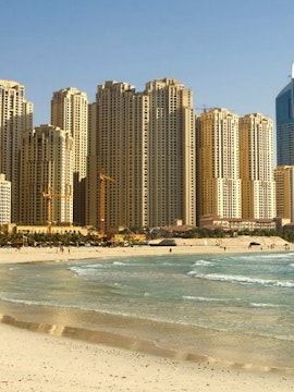 Locals enjoying weekend activities at a bustling Dubai market.