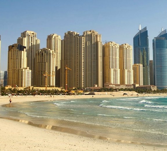 Locals enjoying weekend activities at a bustling Dubai market.