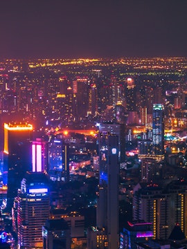 Traditional Thai dancers performing on stage in Bangkok, Thailand.