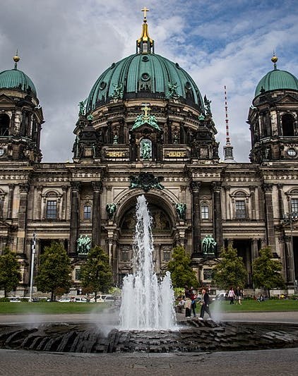 Berlin Cathedral facade with ornate architecture, showcasing historical significance in Berlin attractions.