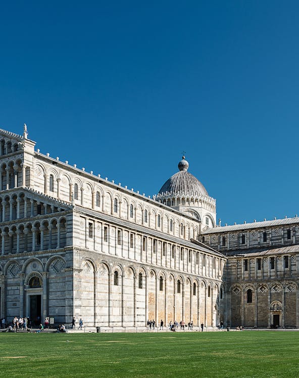 Leaning Tower of Pisa with tourists in Pisa, Italy.