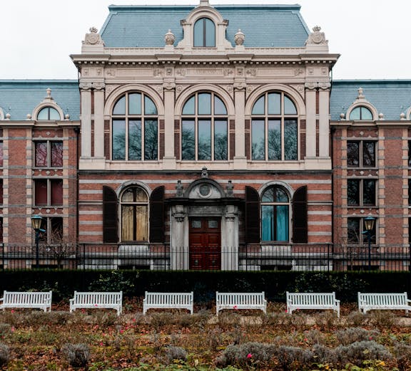 Bicycles parked near the Peace Palace in The Hague, part of Amsterdam to The Hague tours.