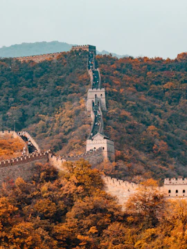 Badaling section of the Great Wall of China, Beijing, with tourists exploring the historic site.