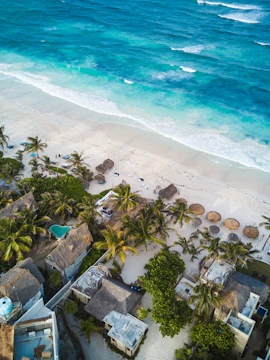 Tulum ruins overlooking the Caribbean Sea, Coba pyramid in the distance, Cancun tour.