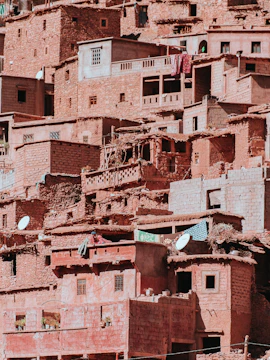 Marrakech to Atlas Mountains tour showcasing scenic mountain landscape and traditional Berber village.