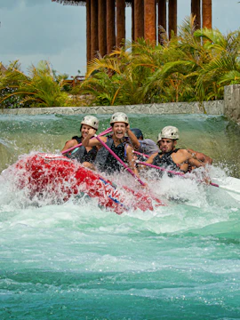 Xavage adventure park in Cancun featuring zip lines and water activities.