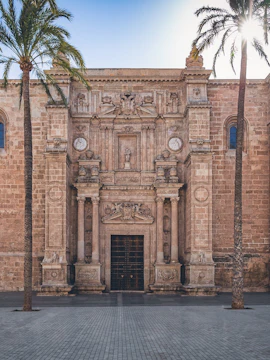 Day trip from Almeria featuring coastal views and historic landmarks.