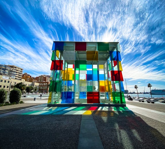 Centre Pompidou Málaga exterior with colorful glass cube in Málaga, Spain.