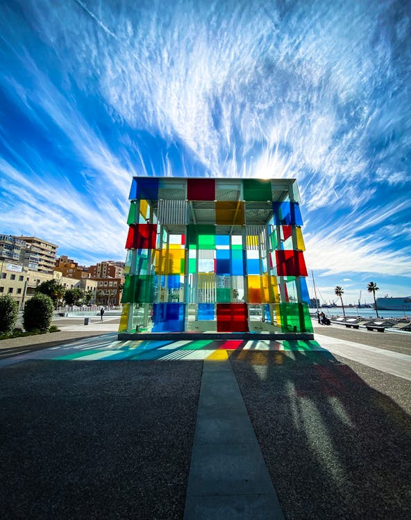 Centre Pompidou Málaga exterior with colorful glass cube in Málaga, Spain.