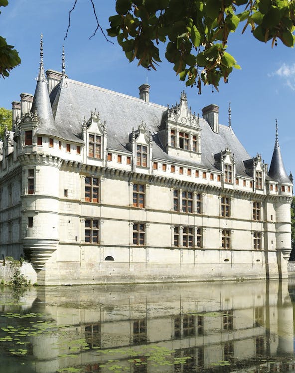 Château d'Azay-le-Rideau in Loire Valley with surrounding gardens and moat.