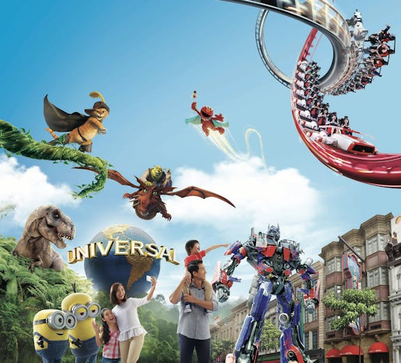 Universal Studios Singapore entrance with iconic globe and visitors exploring the theme park.
