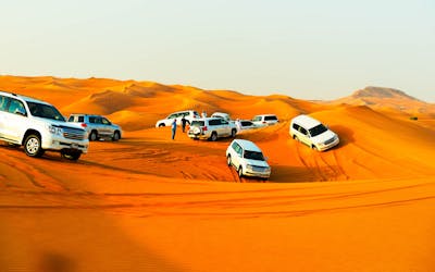 Arabian Dune Desert Safari with Sandboarding, Camel Ride & BBQ Dinner