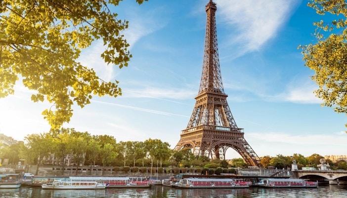 Eiffel Tower in Paris with festive December lights.