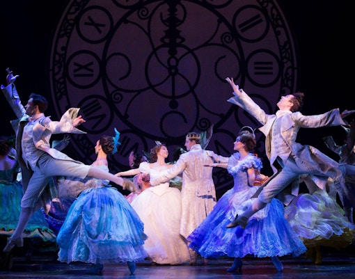 Cinderella pantomime cast performing on stage in London.