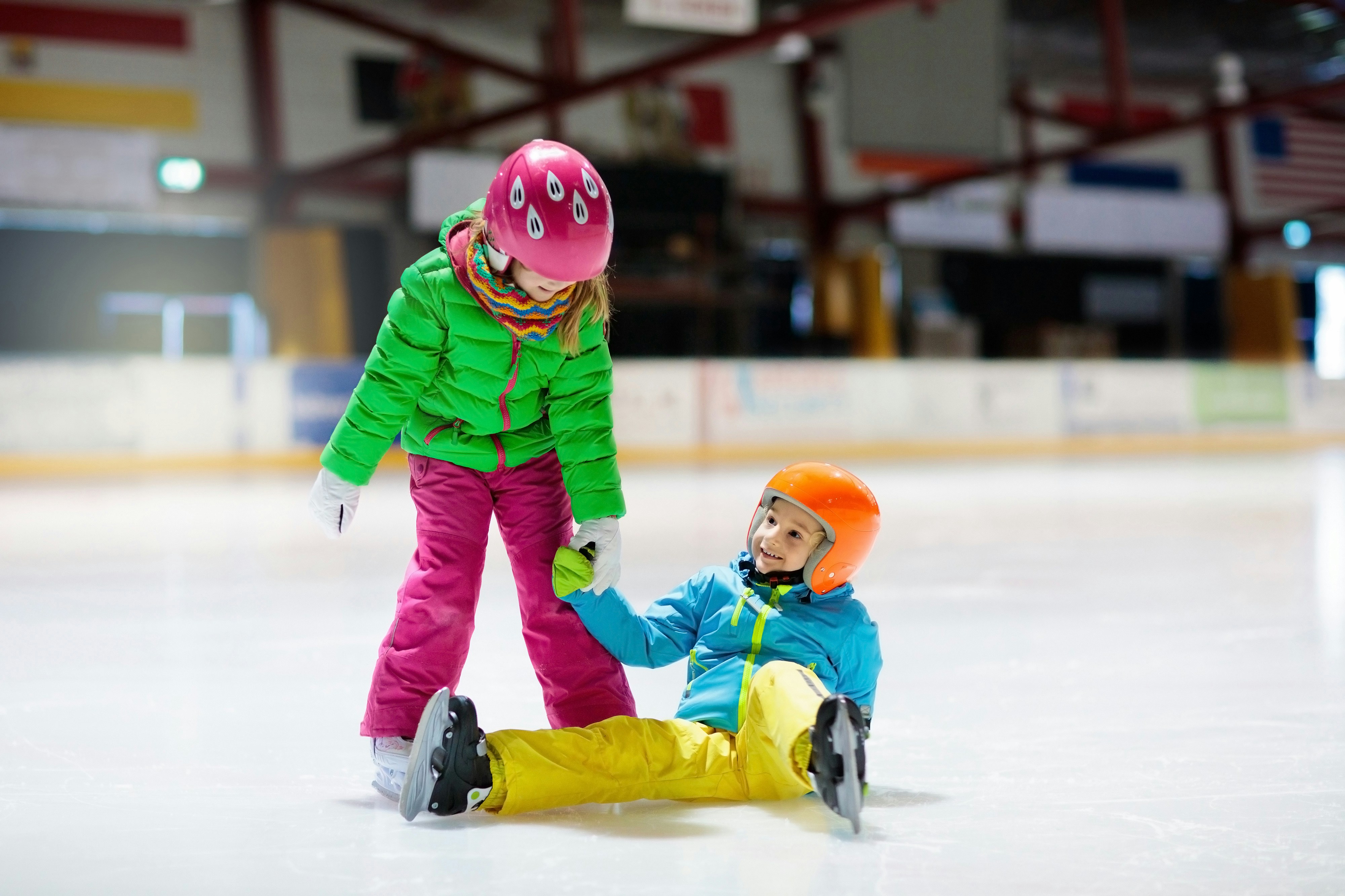 Children ice skating at Dubai Mall ice rink.