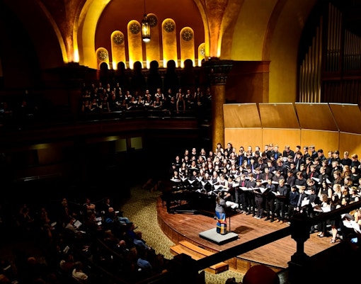 Choir performing in a historic Amsterdam church during January.