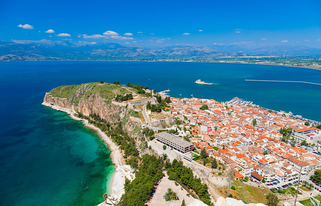 Nafplio harbor view with boats and Palamidi Fortress, Greece, near Athens in August.