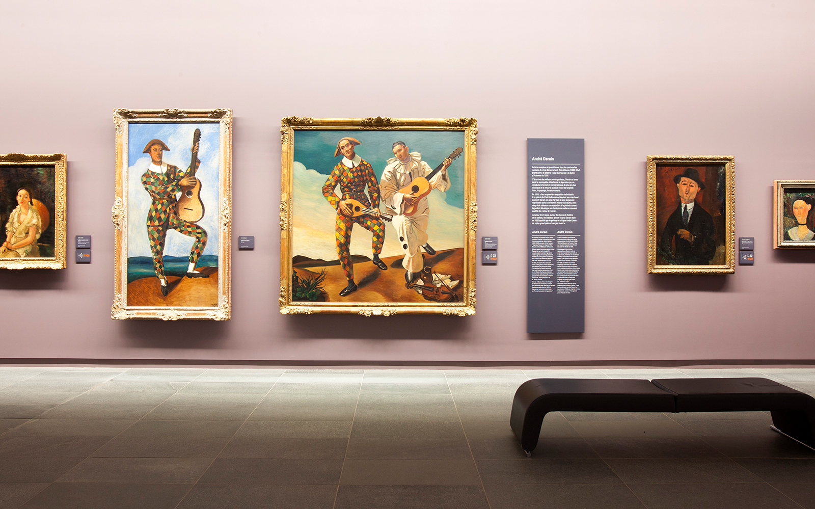 Paintings displayed at Musée de l’Orangerie, Paris, featuring musicians in colorful attire.