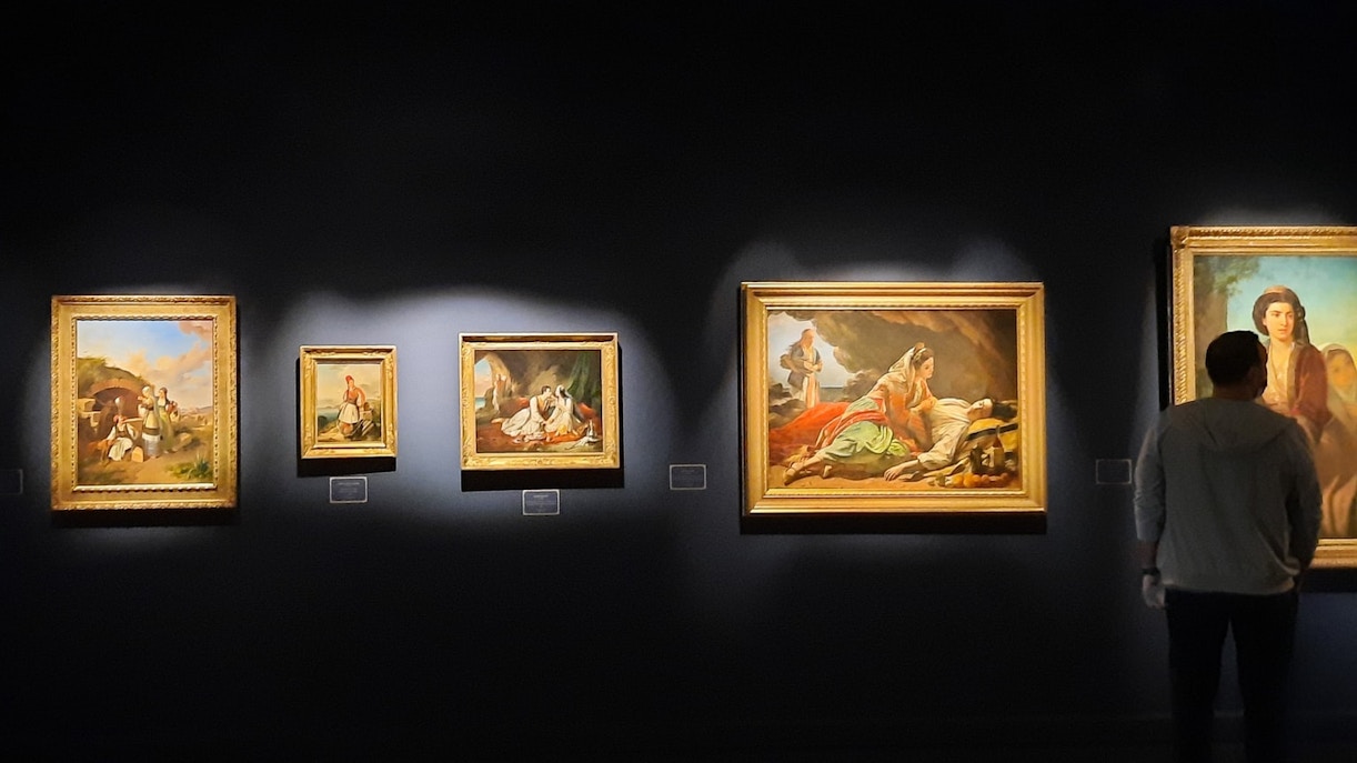 Benaki Museum Athens exterior with neoclassical architecture and visitors entering.