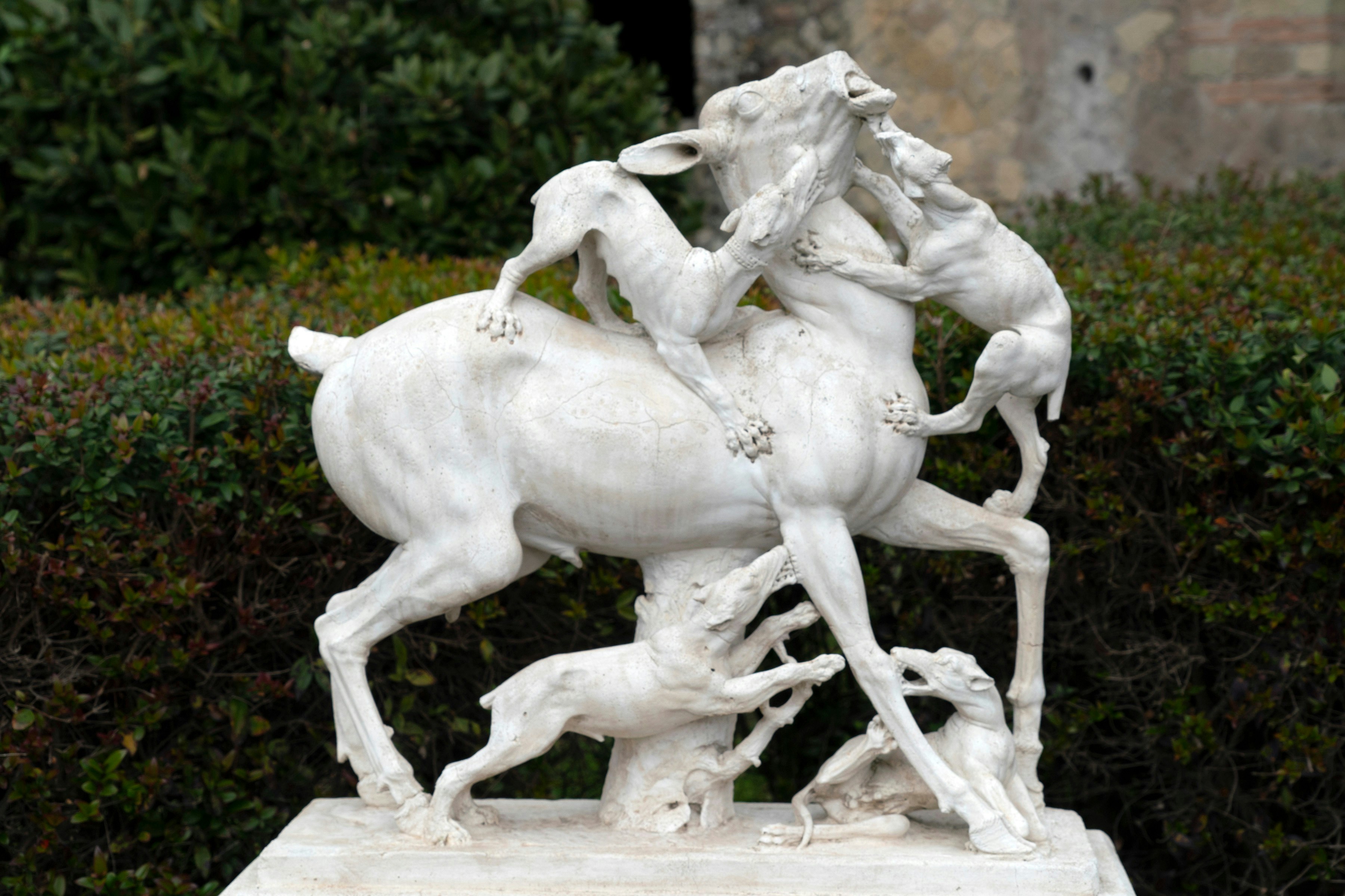 Statue of a deer attacked by dogs at Herculaneum Ruins.