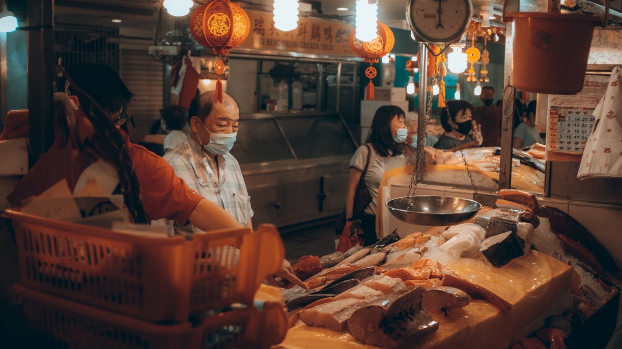 Singapore street food stalls at night, vibrant lights, Valentine's Day atmosphere.