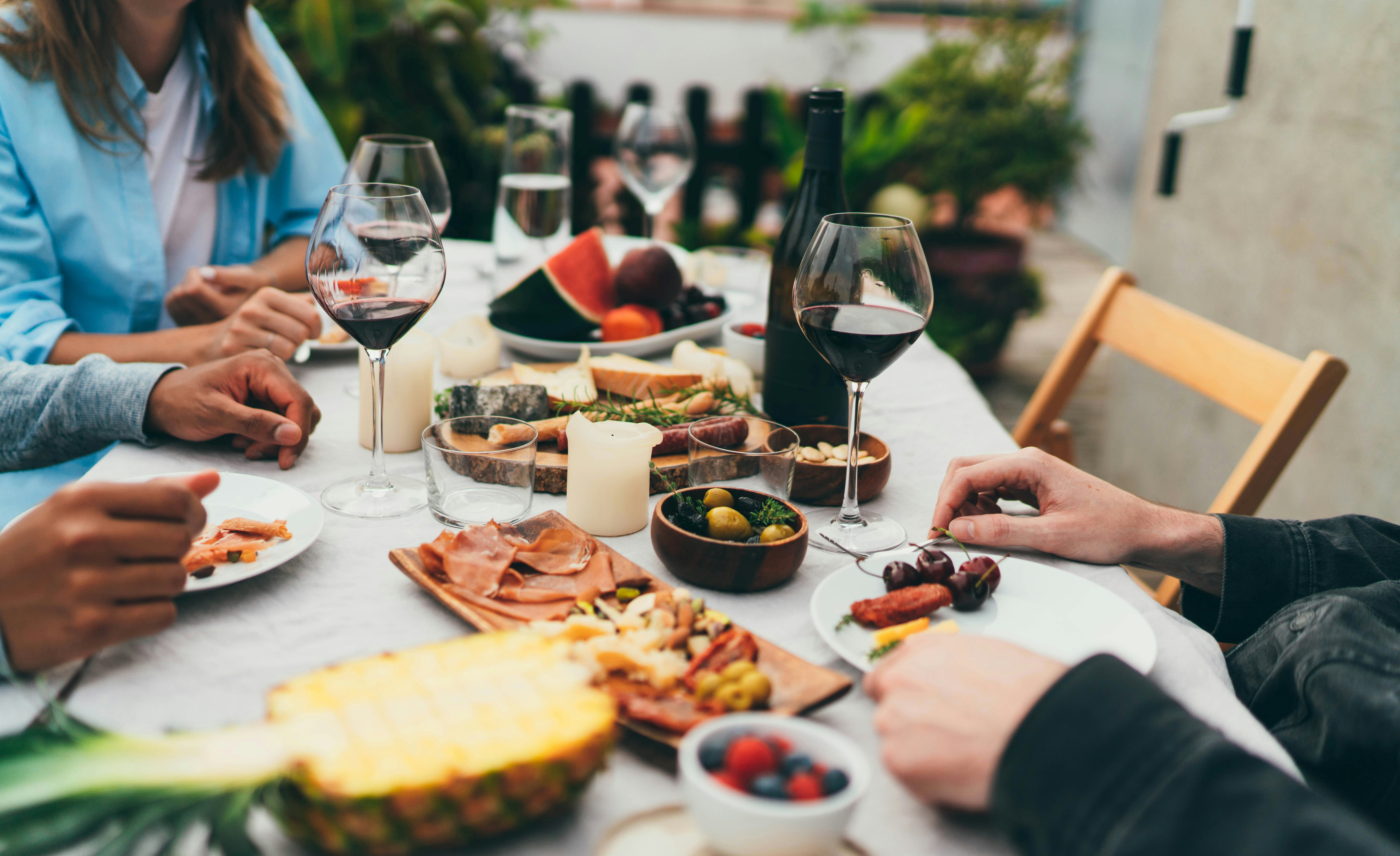 Group of people enjoying Catalan food