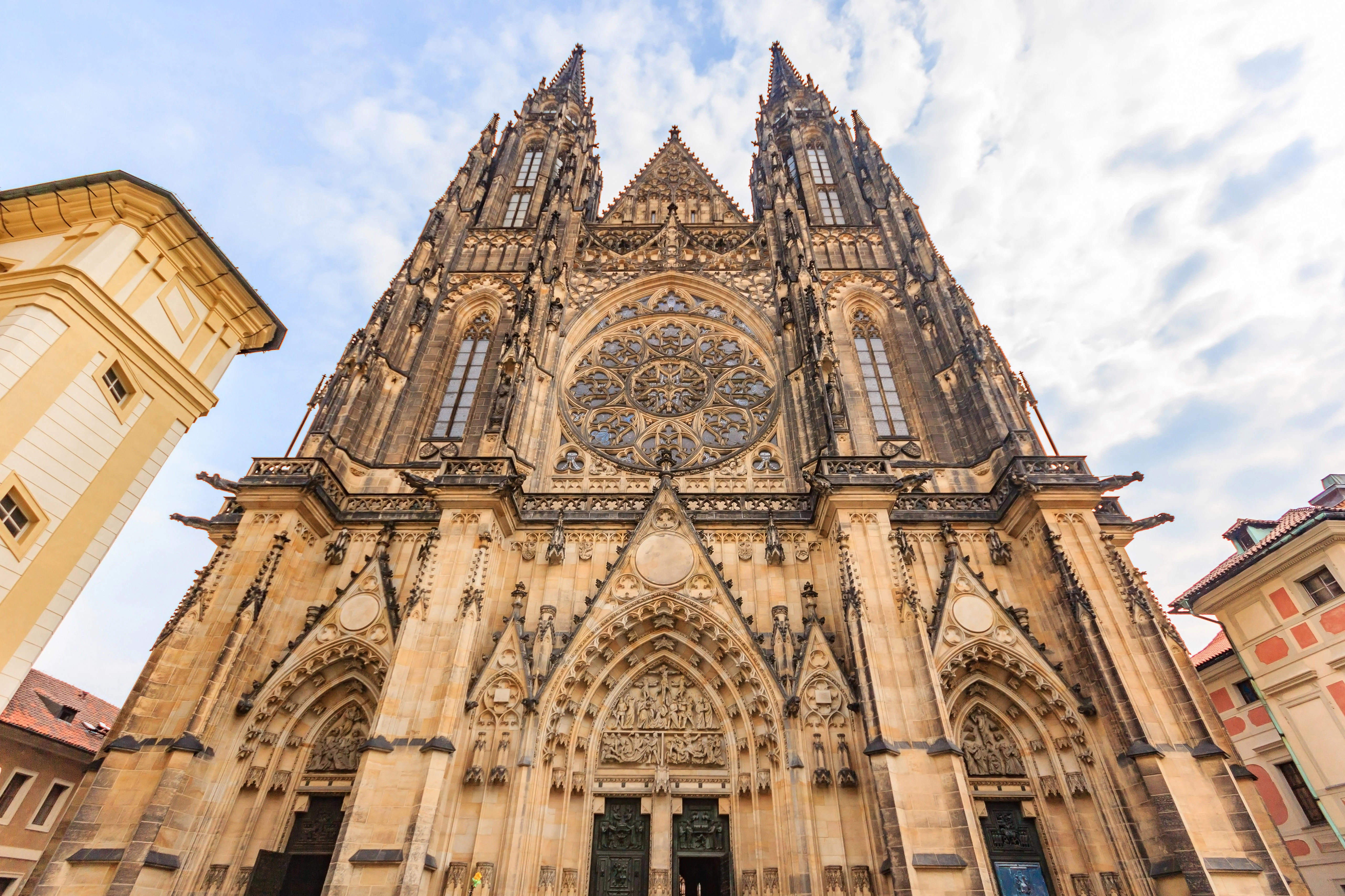 St. Vitus Cathedral facade with intricate Gothic architecture in Prague.