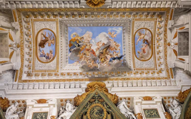 Pitti Palace exterior with visitors on guided tour in Florence, Italy.