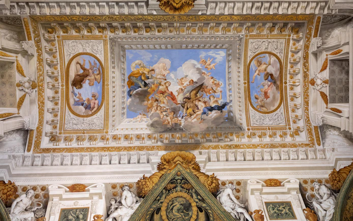 Pitti Palace exterior with visitors on guided tour in Florence, Italy.