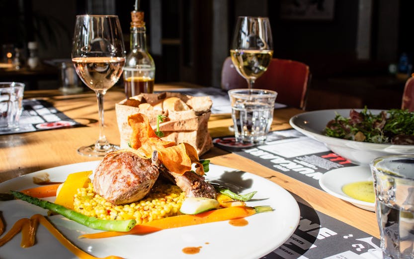 Paris culinary tour featuring local chefs preparing traditional French dishes.