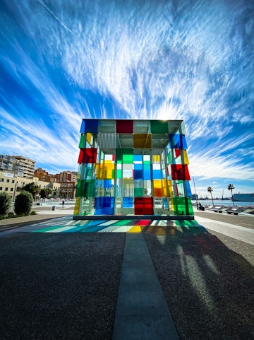 Centre Pompidou Málaga exterior with colorful glass cube in Málaga, Spain.