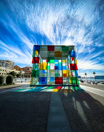 Centre Pompidou Málaga exterior with colorful glass cube in Málaga, Spain.