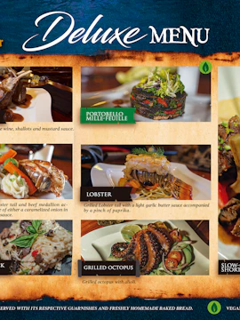 Deluxe menu for Cancun Pirate Show featuring rack of lamb, surf and turf, lobster, and grilled octopus.
