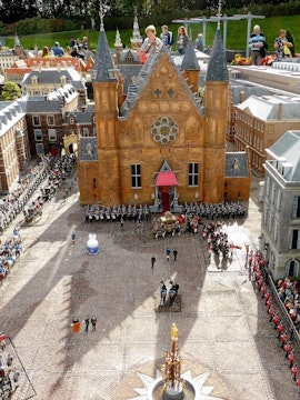 Miniature model of Binnenhof in The Hague with people observing the detailed architecture.