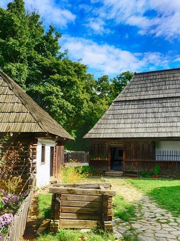 Traditional wooden houses at Dimitrie Gusti National Village Museum, Bucharest.