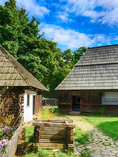 Traditional wooden houses at Dimitrie Gusti National Village Museum, Bucharest.