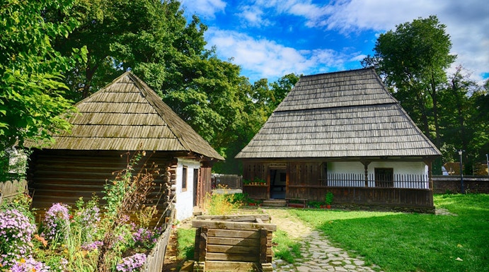 Traditional wooden houses at Dimitrie Gusti National Village Museum, Bucharest.