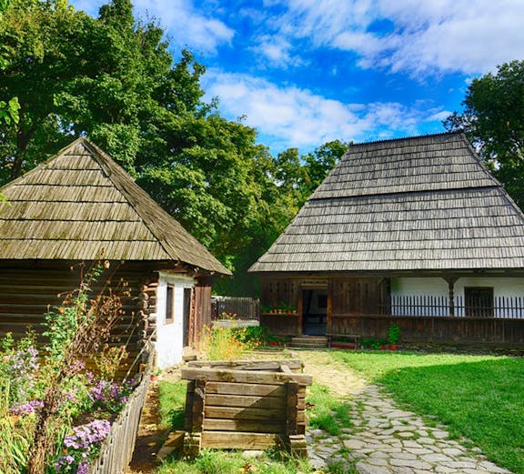Traditional wooden houses at Dimitrie Gusti National Village Museum, Bucharest.