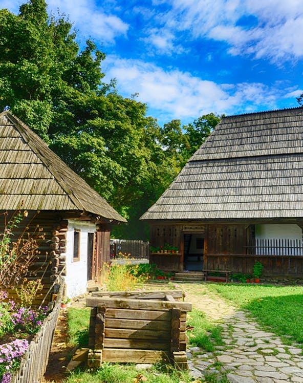 Traditional wooden houses at Dimitrie Gusti National Village Museum, Bucharest.