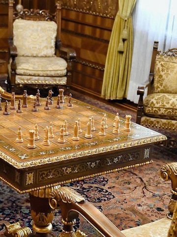 Chess set in ornate room at House of Ceauşescu, Bucharest.