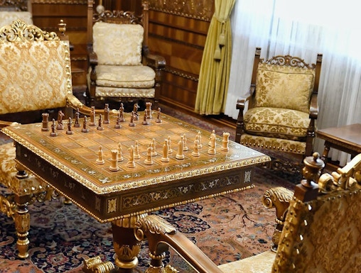 Chess set in ornate room at House of Ceauşescu, Bucharest.