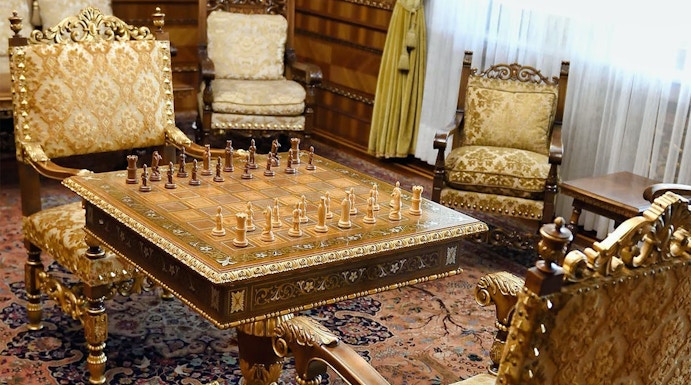 Chess set in ornate room at House of Ceauşescu, Bucharest.
