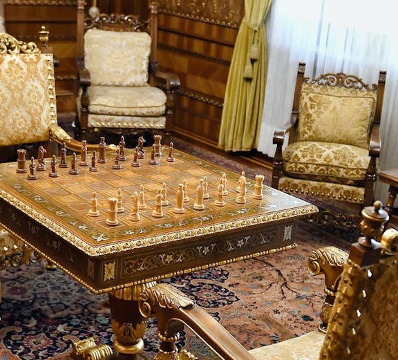 Chess set in ornate room at House of Ceauşescu, Bucharest.
