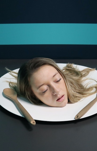 Head on a plate illusion at Museum of Illusions, Madrid.