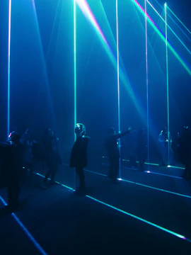 Visitors interacting with light installation at Singapore Discovery Centre.