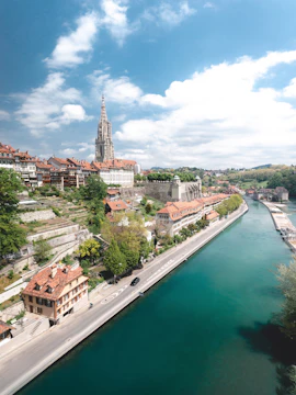 Aerial view of Bern with the Aare River and Bern Cathedral, part of Zurich to Bern tours.