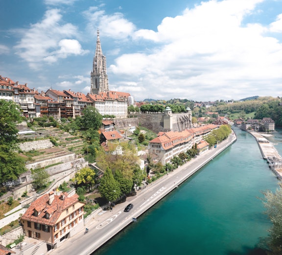 Aerial view of Bern with the Aare River and Bern Cathedral, part of Zurich to Bern tours.