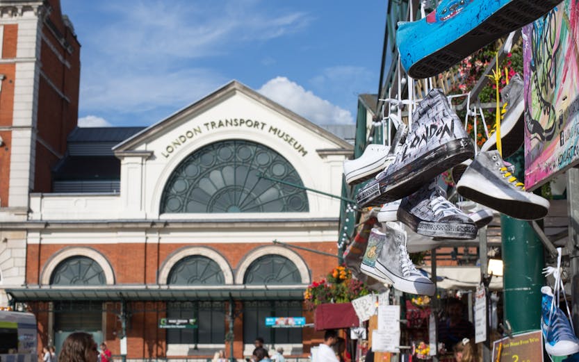 London Transport Museum entrance with hanging sneakers in foreground.