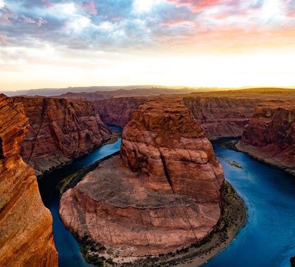 Horseshoe Bend view near Grand Canyon Visitor's Center with river and canyon landscape.